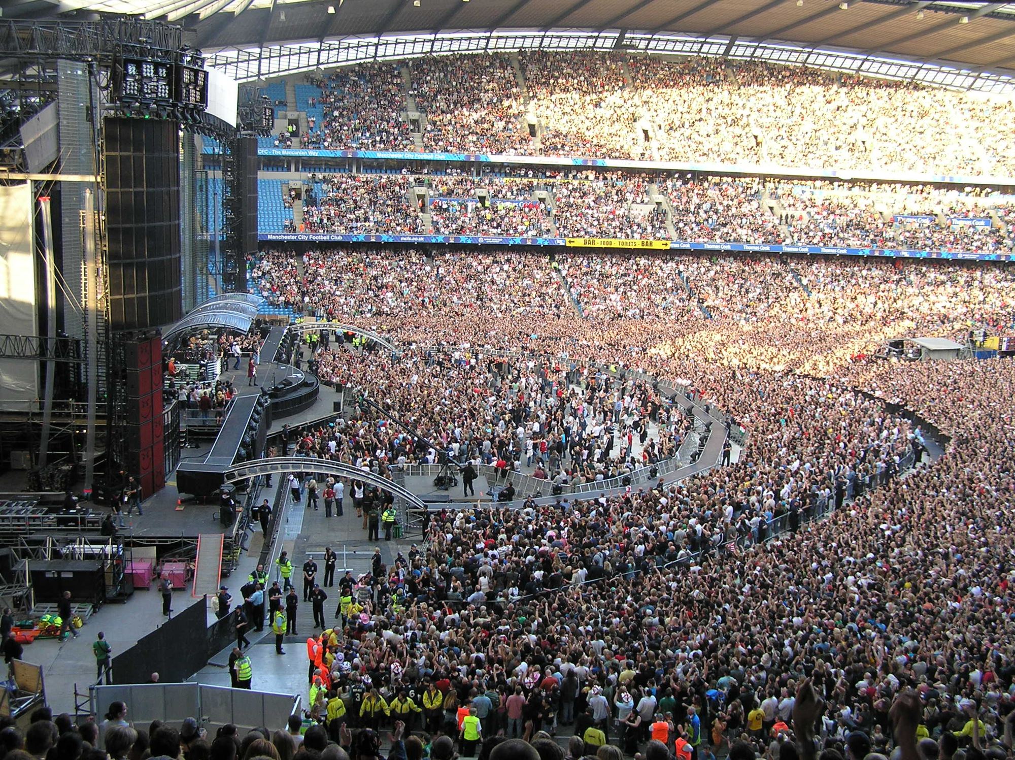 Packed stadium crowd from the side of the stage, Bon Jovi Manchester 2006